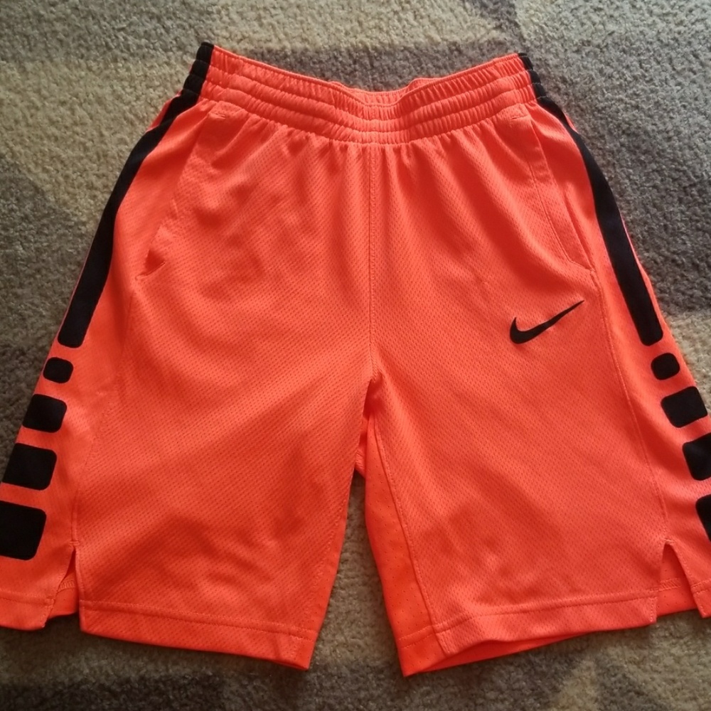Boys bright orange Nike basketball shorts